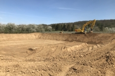 Waterbassin en grondwerk nieuwbouwloods De Fruitboer